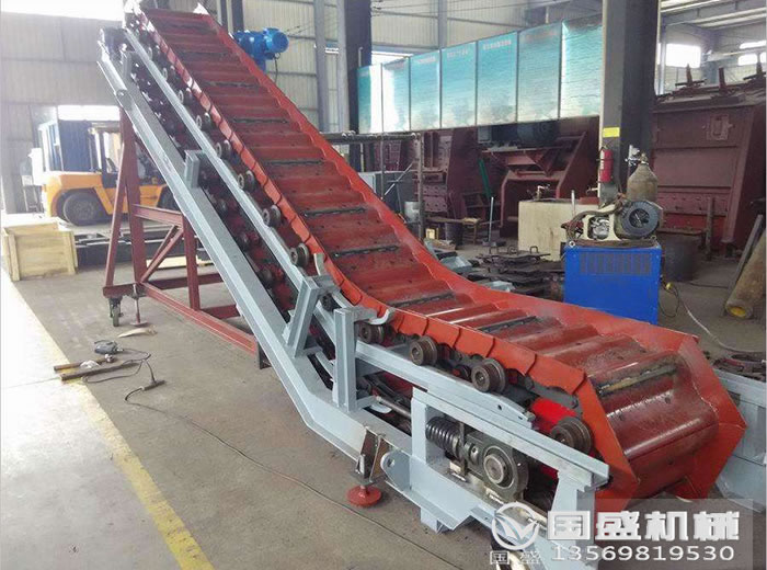 水泥專(zhuān)用重型鱗板輸送機(jī) 水泥專(zhuān)用重型鱗板輸送機(jī)